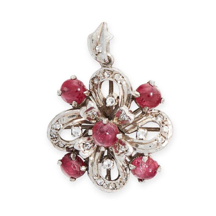 A RED SPINEL PENDANT the twisted ribbon motif set with round cut white gemstones and accented by