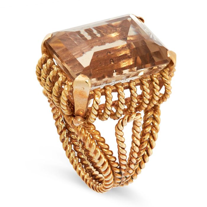 A VINTAGE CITRINE DRESS RING set with an emerald cut citrine of 19.0 carats, within a twisted - Image 2 of 3