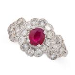 A RUBY AND DIAMOND RING in 18ct white gold, set with an oval cut ruby of 0.82 carats within a