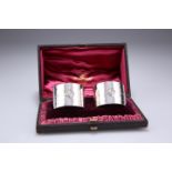 A PAIR OF GEORGE V SILVER NAPKIN RINGS