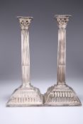 A PAIR OF GEORGE III SILVER CORINTHIAN COLUMN CANDLESTICKS