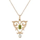 AN EDWARDIAN PERIDOT AND MOTHER-OF-PEARL PENDANT ON CHAIN