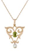 AN EDWARDIAN PERIDOT AND MOTHER-OF-PEARL PENDANT ON CHAIN