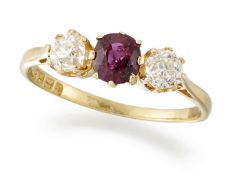 AN 18CT GOLD RUBY AND DIAMOND THREE STONE RING