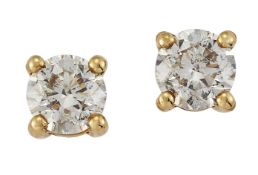 A PAIR OF SOLITAIRE DIAMOND STUD EARRINGS