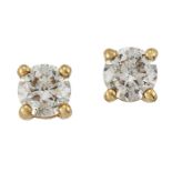 A PAIR OF SOLITAIRE DIAMOND STUD EARRINGS