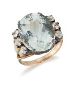 AN AQUAMARINE AND DIAMOND RING