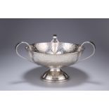 AN ART NOUVEAU SILVER-PLATED THREE-HANDLED TAZZA