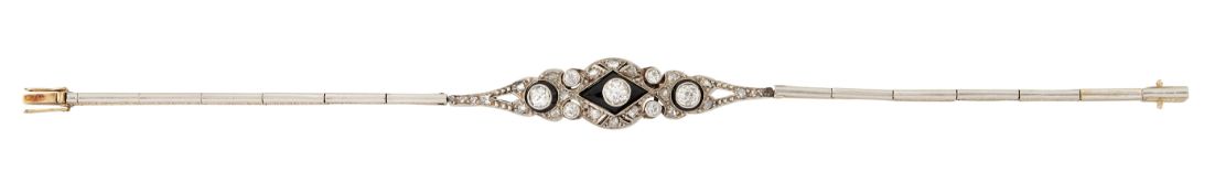 AN ART DECO DIAMOND AND ONYX BRACELET