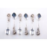 A SET OF SIX CONTINENTAL SILVER METAL COFFEE SPOONS