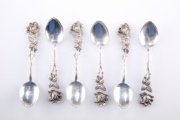 A SET OF SIX CONTINENTAL SILVER METAL COFFEE SPOONS