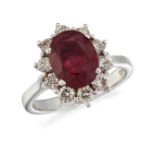 AN 18CT WHITE GOLD RUBY AND DIAMOND CLUSTER RING