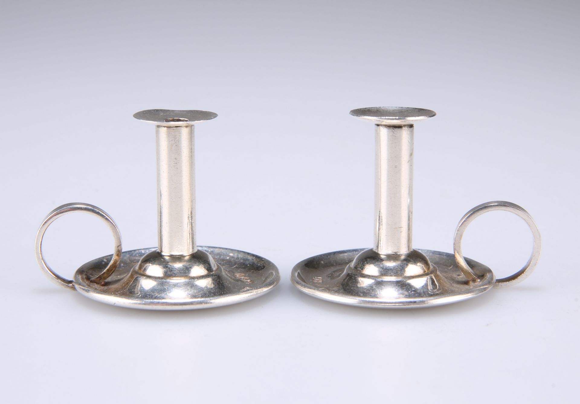 A PAIR OF VICTORIAN MINIATURE SILVER CHAMBERSTICKS