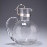 A LATE VICTORIAN SILVER-MOUNTED CLARET JUG