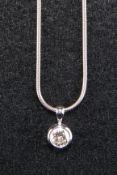 AN 18CT WHITE GOLD DIAMOND PENDANT,