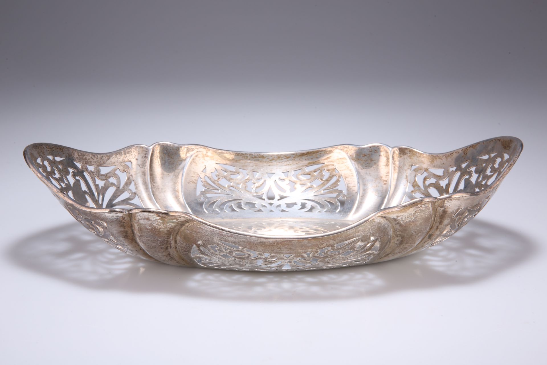 A GEORGE V SILVER PIERCED DISH