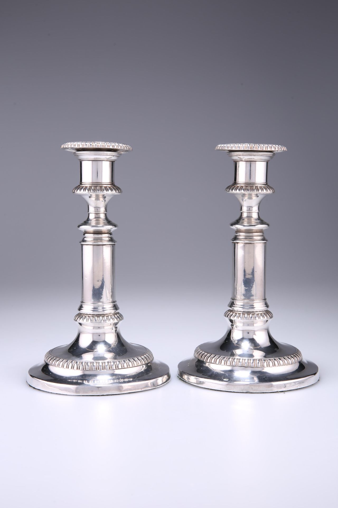 A PAIR OF OLD SHEFFIELD PLATE TELESCOPIC CANDLESTICKS