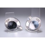 A PAIR OF TIFFANY & CO STERLING SILVER DISHES, of shallow circular form with scroll-motif thumb-