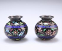 A SMALL PAIR OF SILVER AND ENAMEL VASES