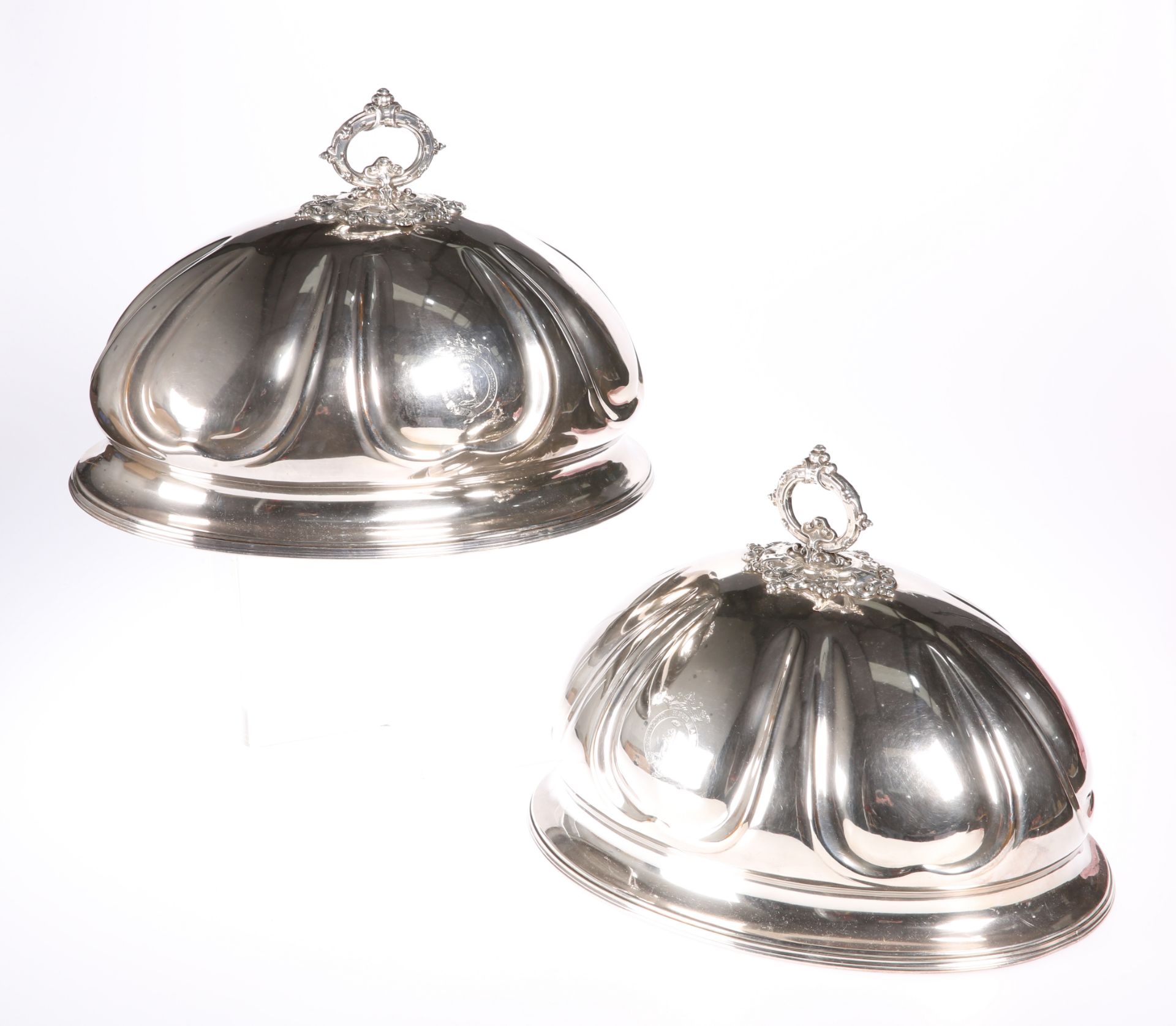 A PAIR OF 19TH CENTURY SILVER-PLATED MEAT COVERS