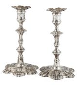 A PAIR OF GEORGE II SILVER CANDLESTICKS