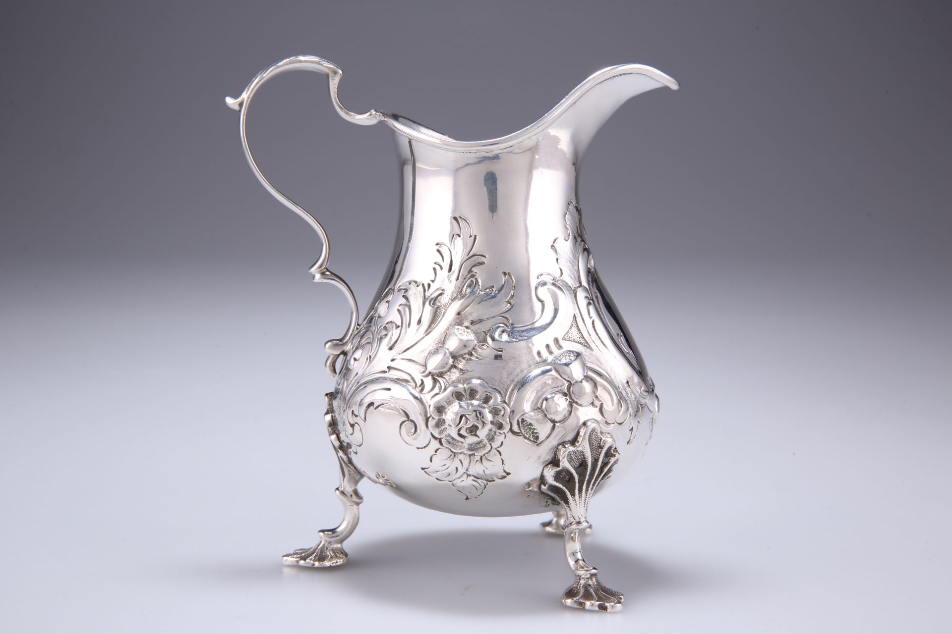 A VICTORIAN SILVER CREAM JUG