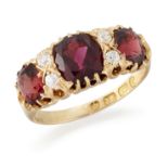 AN 18CT GOLD GARNET AND DIAMOND RING