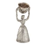 A CONTINENTAL WHITE METAL WAGER CUP