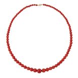 A CORAL BEAD NECKLACE