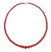 A CORAL BEAD NECKLACE