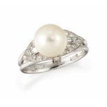 AN ART DECO CULTURED PEARL AND DIAMOND RING