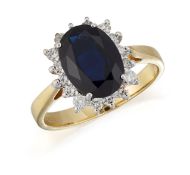 AN 18CT GOLD SAPPHIRE AND DIAMOND CLUSTER RING