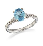 AN 18CT WHITE GOLD AQUAMARINE AND DIAMOND RING