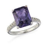 AN 18CT WHITE GOLD PURPLE SAPPHIRE AND DIAMOND RING