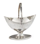 A GEORGE III SILVER SWING-HANDLE SUGAR BASKET