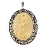 A GERMAN CARVED IVORY CAMEO BROOCH