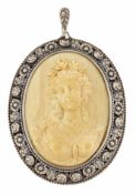 A GERMAN CARVED IVORY CAMEO BROOCH