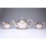 A FINE CHINESE EXPORT SILVER THREE-PIECE TEA SERVICE, EARLY 20TH CENTURY