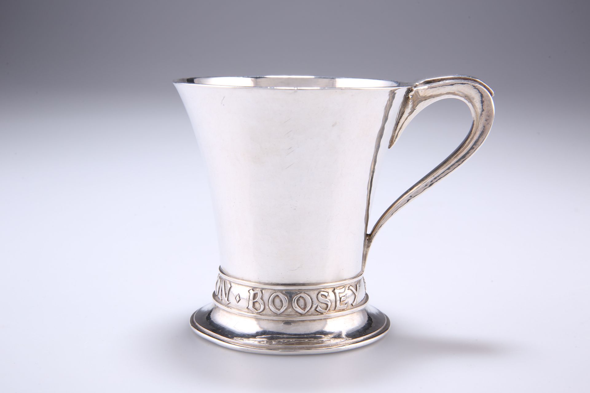 AN ARTS AND CRAFTS SILVER MUG