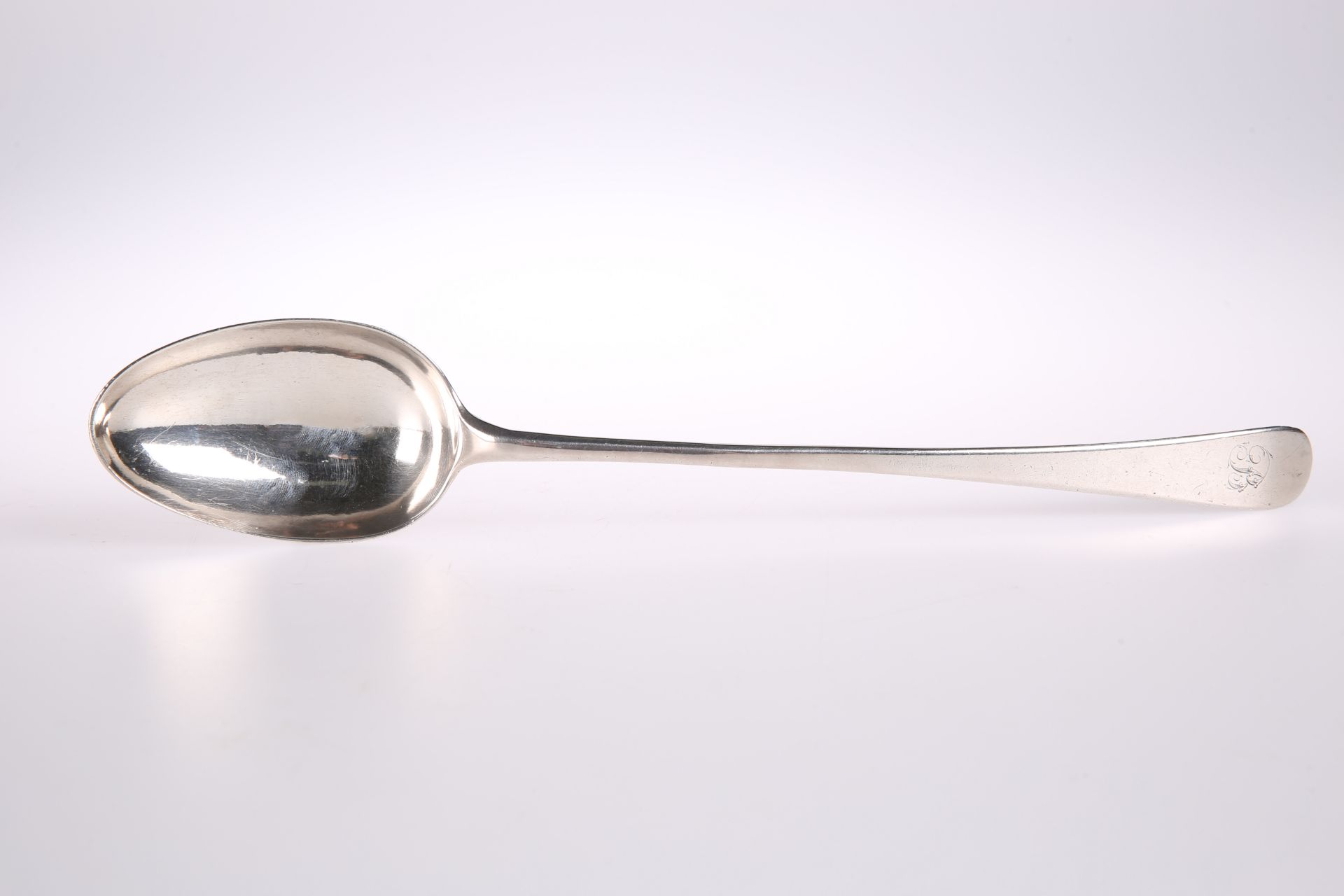 A GEORGE III OLD ENGLISH PATTERN SILVER BASTING SPOON