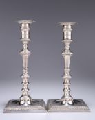 A PAIR OF GEORGE II SILVER CANDLESTICKS