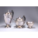 A GEORGE V SILVER THREE-PIECE TEA SERVICE