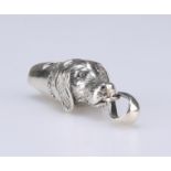 A NOVELTY SILVER DOG WHISTLE