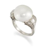 A NATURAL SALTWATER PEARL AND DIAMOND RING