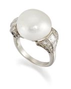 A NATURAL SALTWATER PEARL AND DIAMOND RING