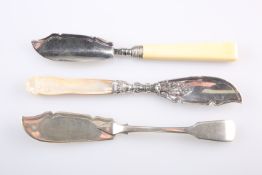 A GROUP OF THREE VICTORIAN SILVER BUTTER KNIVES