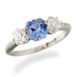 A SAPPHIRE AND DIAMOND THREE STONE RING