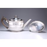 A GEORGE III SILVER TEAPOT