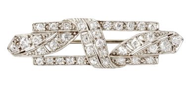 AN ART DECO DIAMOND BROOCH