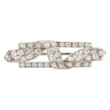 AN ART DECO DIAMOND BROOCH